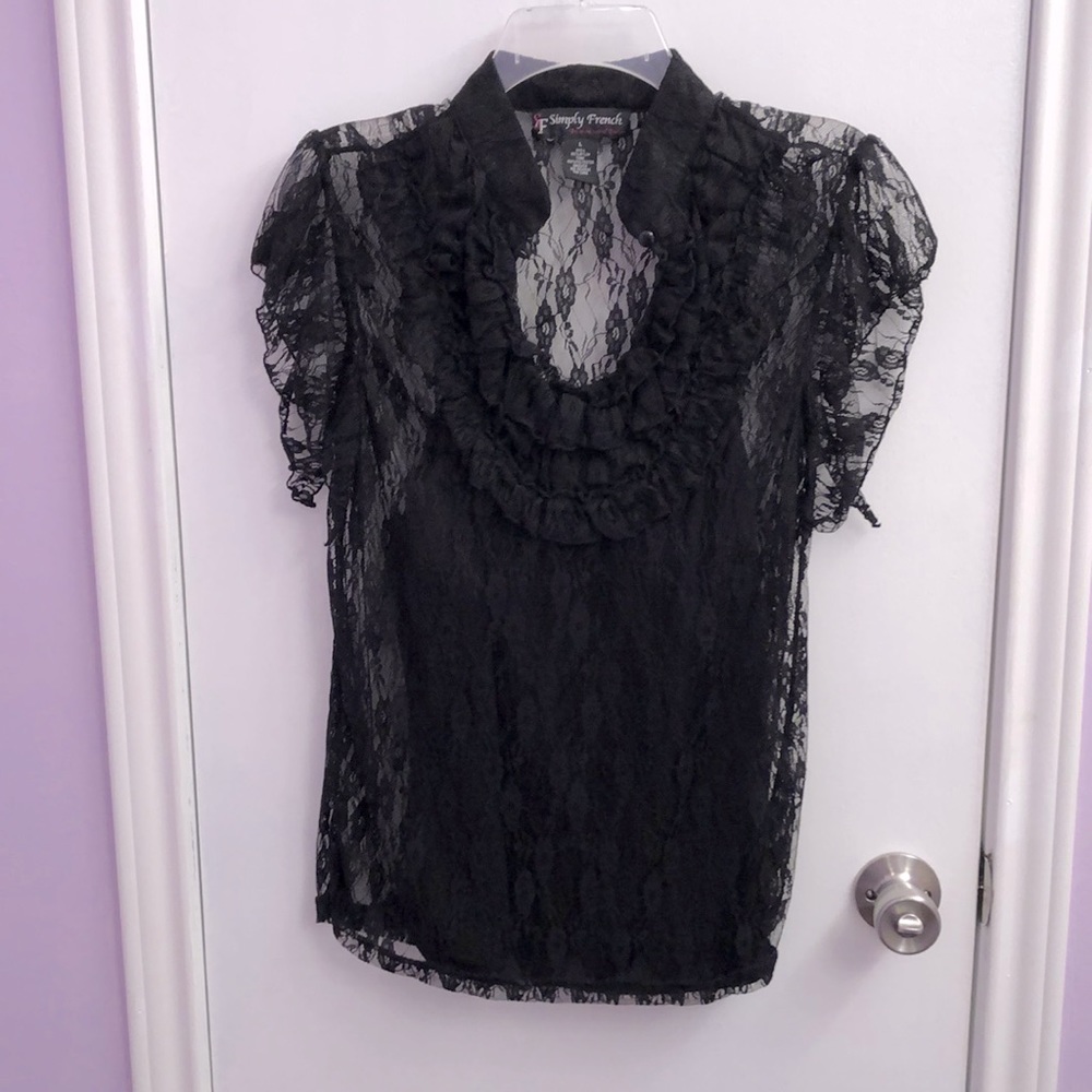 Lovely black lace shell 100% nylon, tank liner 100% polyester.